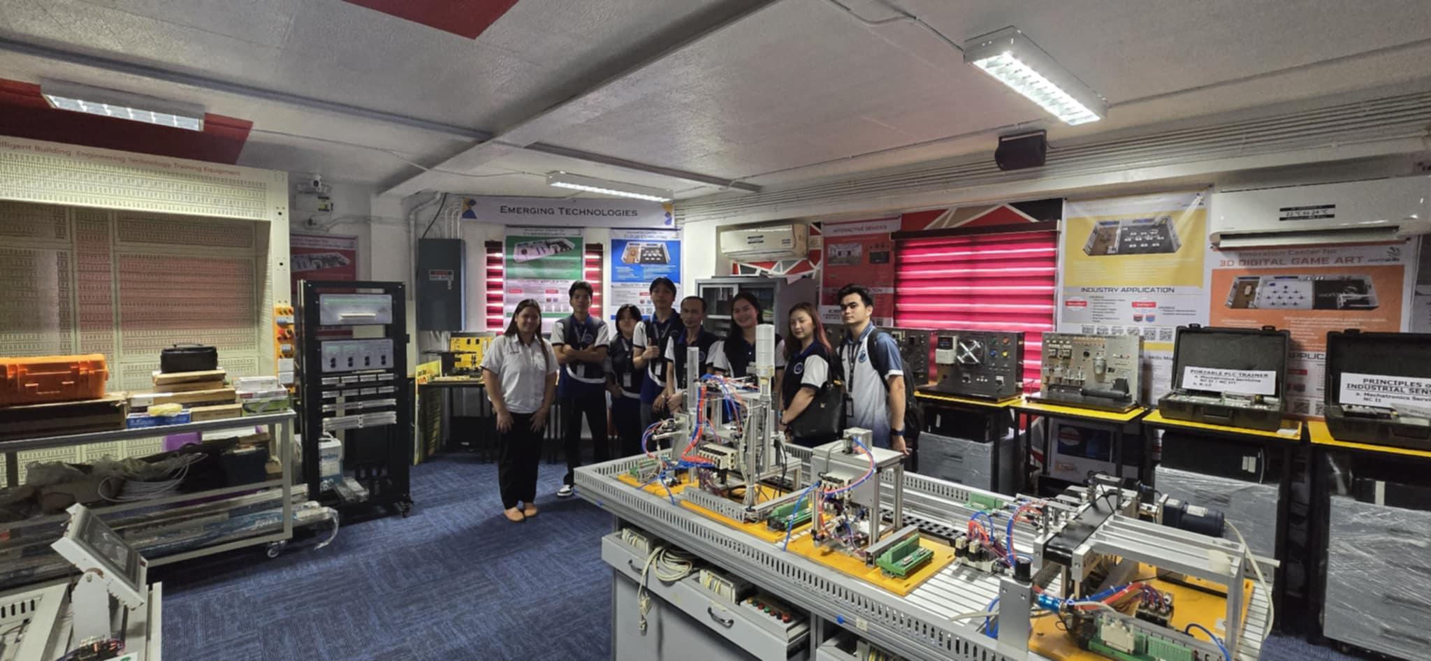 Group photo of students and faculty at Hytech Power Inc.